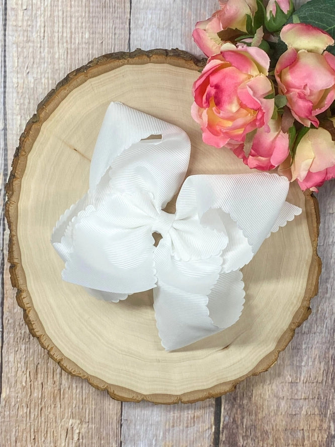 Scalloped White Bow